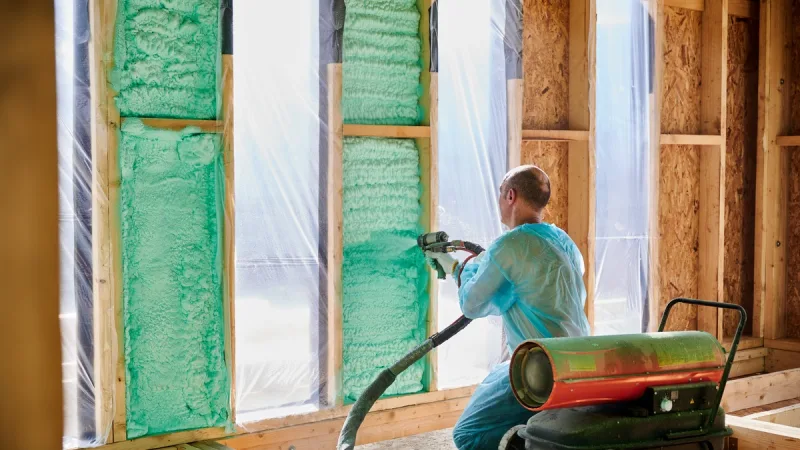 Foam going into a new-construction wall assembly ahead of drywall